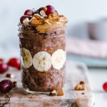 fruits and cream in clear glass cup