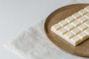 Delicious white chocolate on ceramic plate