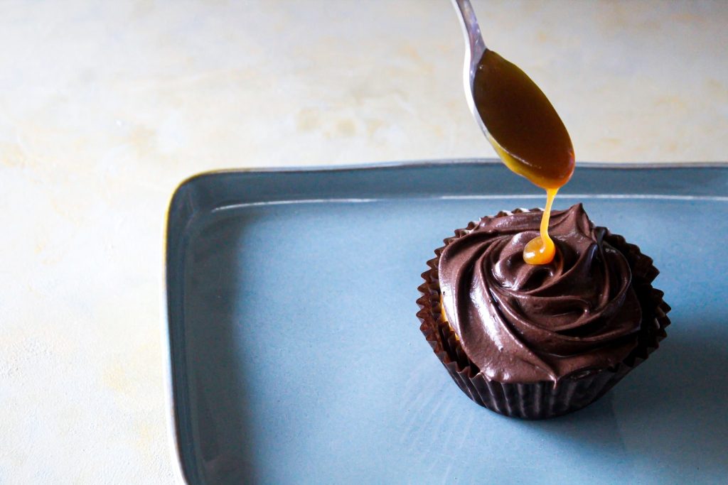 a cupcake with a spoon