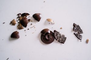 Photo Of Smashed Chocolate On A White Background