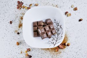 chocolate bar on white ceramic plate